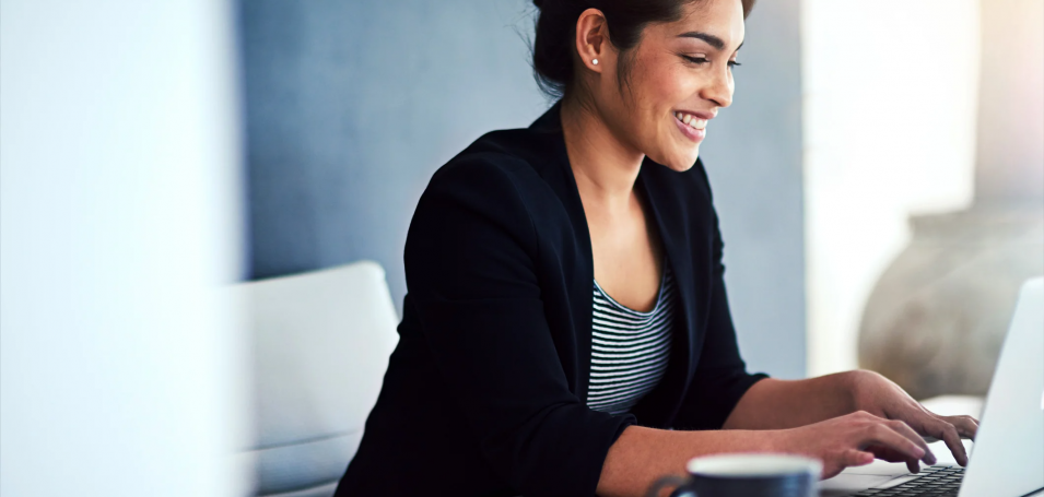 Woman typing on laptop