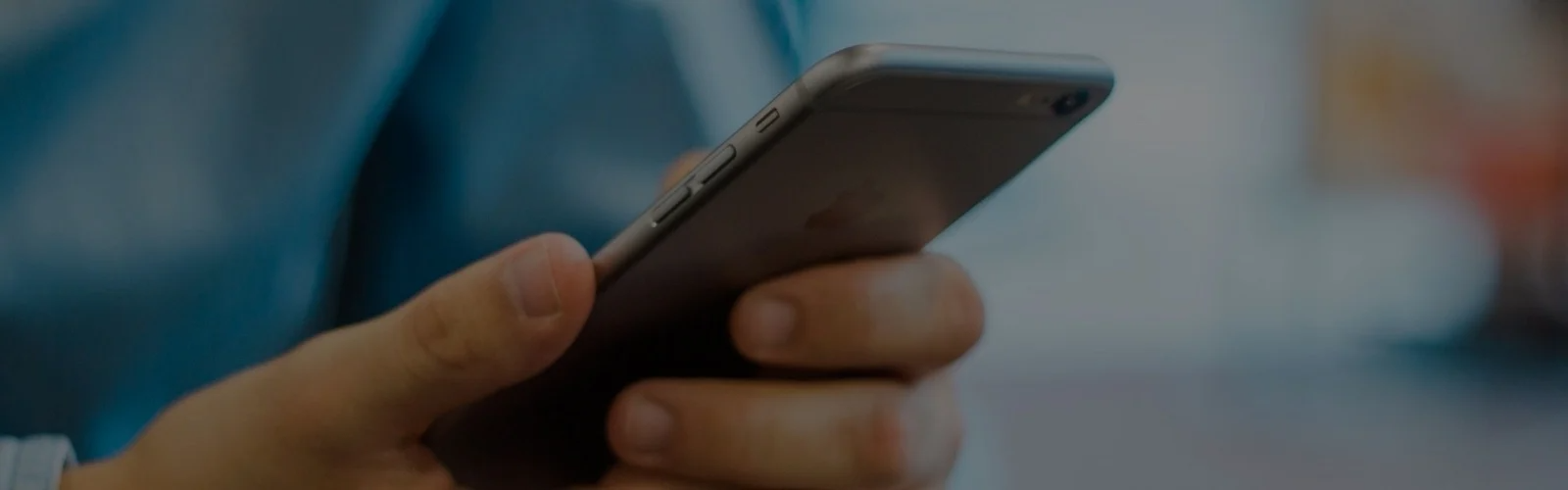 Hands holding smartphone
