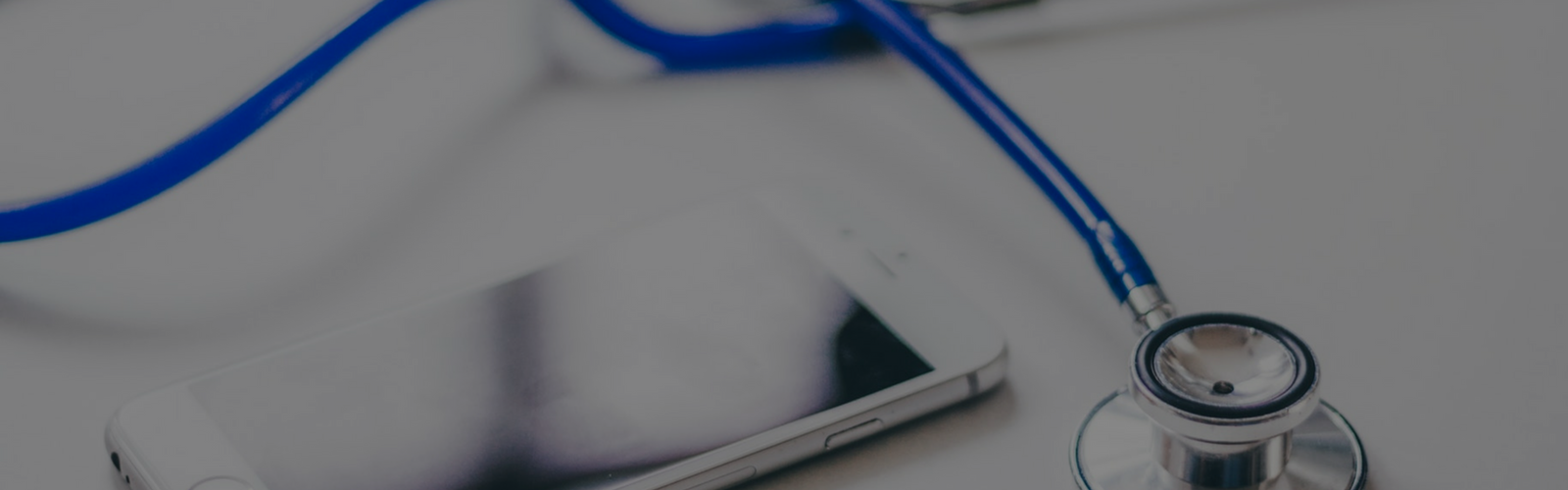 Stethoscope next to a smartphone