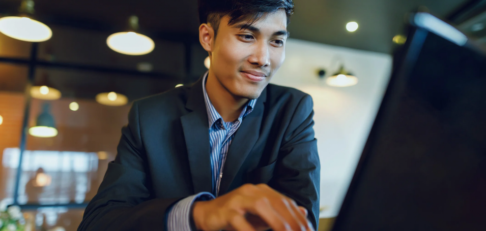 Man looking at a laptop