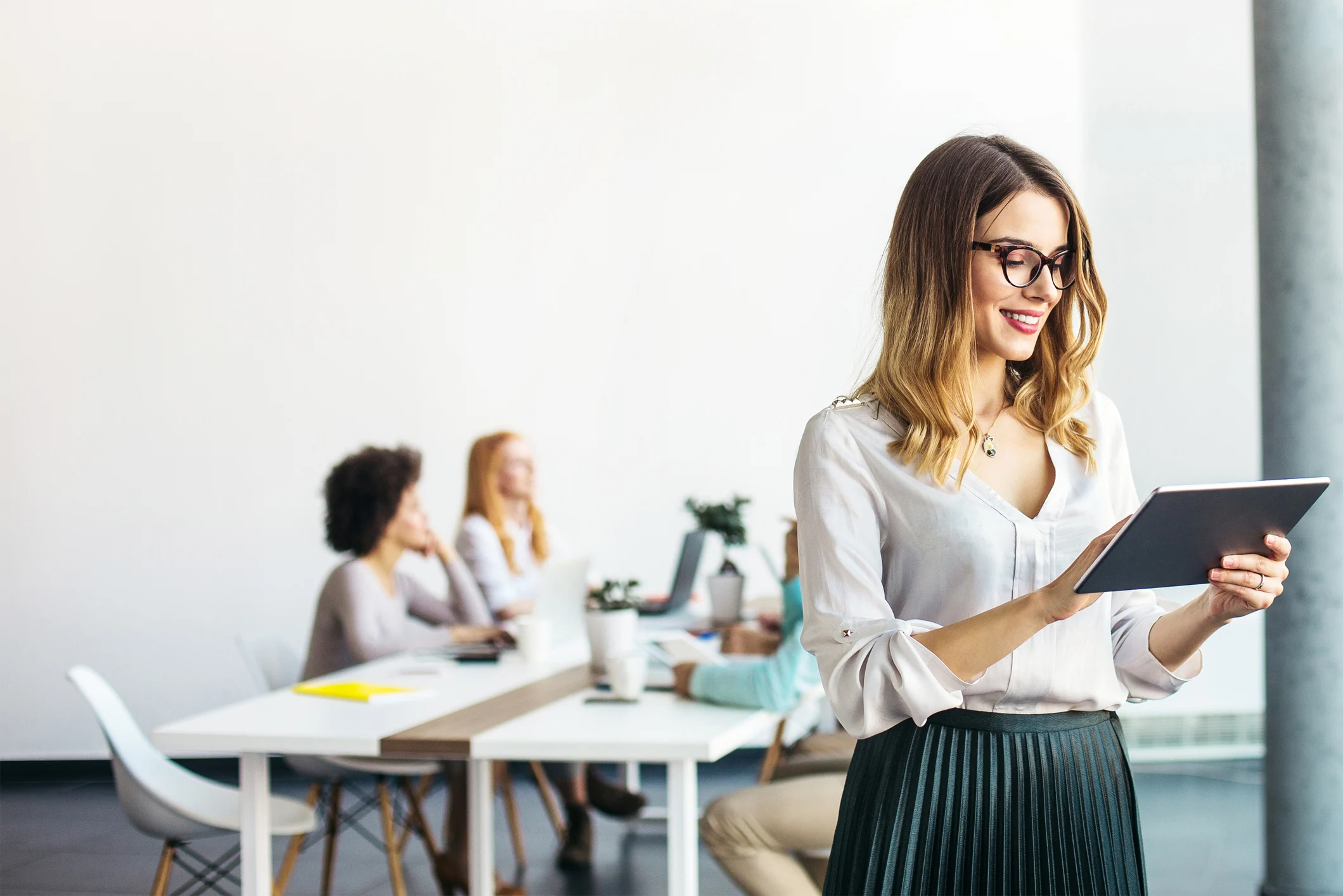 Woman holding a tablet